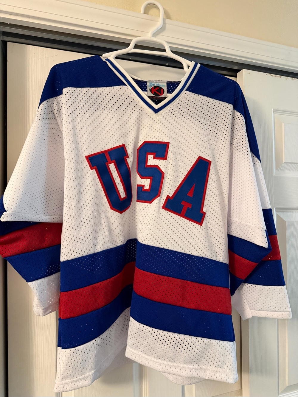 The style of the1980 USA Olympic Team's Hockey Jersey - White/Blue/Red Like New